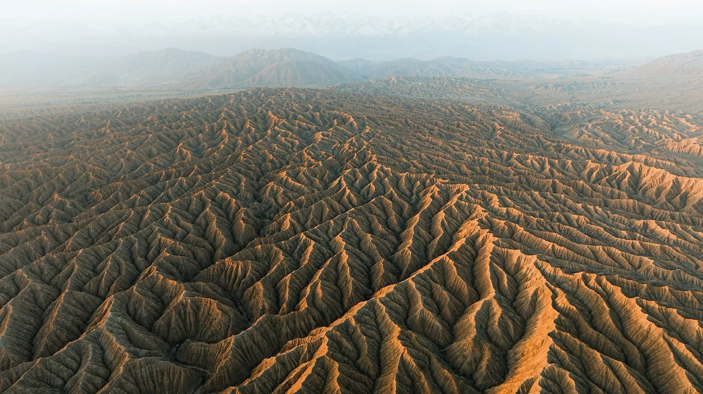 Aerial view of eroded mountain ridgelines